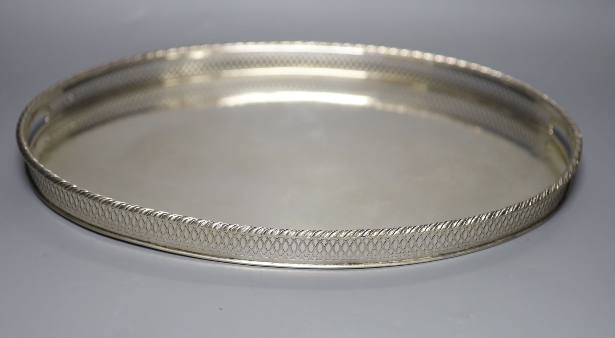 An Italian 800 standard white metal oval tray by Missiaglia, 22oz; L 46cm